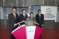 Mr Lam, Ms Cheng, and Mr Hui officiate at the opening ceremony of the miniature Hong Kong Pavilion.
