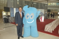 Mr Hui and the Shanghai Expo mascot Haibao.