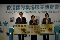 (left to right) Airport Authority Hong Kong (AAHK) Chief Executive Officer Stanley Hui Hon-chung, Secretary for Transport and Housing Eva Cheng and Assistant Commissioner for Labour (Employment Services) Tonia Leung So Suk-ching officiate at the opening ceremony for “HKIA Job Expo 2011”.