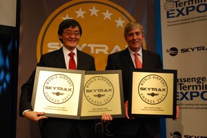 Howard Eng (left), AA's Executive Director, Airport Operations, is delighted to receive three awards including the World's Best Airport award from Edward Plaisted (right), Skytrax's Chairman, in Copenhagen.
