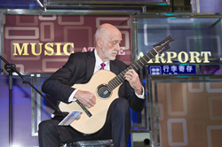 Professor Adrian Walter, Director of the Hong Kong Academy for Performing Arts (HKAPA) and a renowned classical guitarist, gives a solo performance at the opening ceremony.
