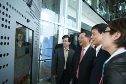 (From left to right) Victor Ng, Director of the Hong Kong Pavilion, Mr Hui and Jing Yiming, Board Chairman, Shanghai Hong Kong Airport Management Co., Ltd, talk with Airport Ambassadors at the Hong Kong International Airport through an interactive portal.