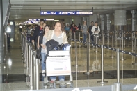 To better manage the increasing number of passengers at the terminals, the 
Airport Authority, Police, airport security staff, airlines and ground handling agents work together to prepare designated areas for passengers of different 
airlines to queue up for check-in. Additional staff and signage are arranged to facilitate passenger flow and maintain terminal order. 